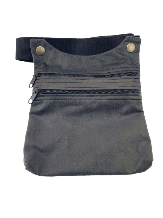 Riñonera hecha en tela en color gris