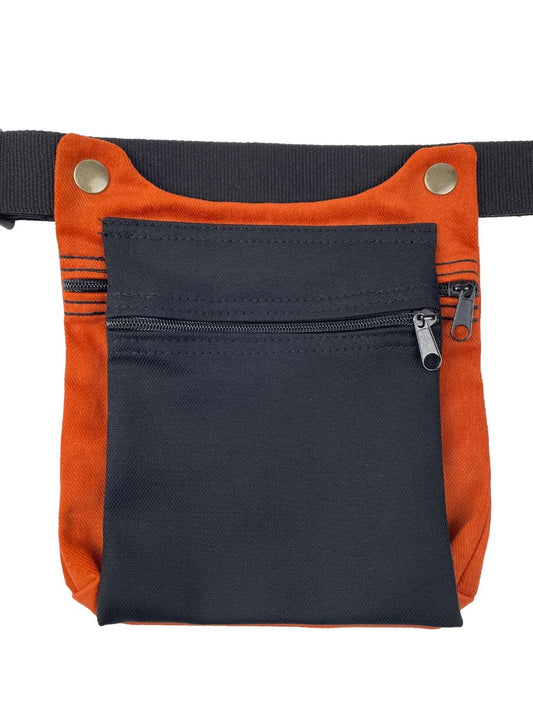 Riñonera artesanal en tela en color naranja y negro