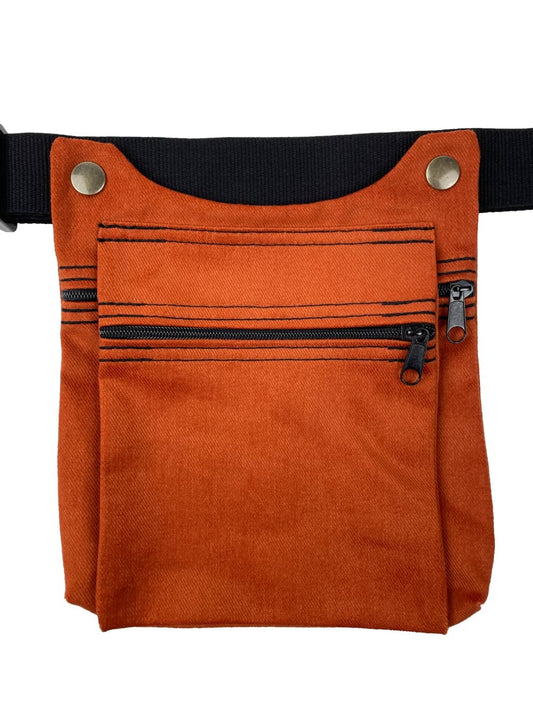 Riñonera artesanal en tela en color naranja