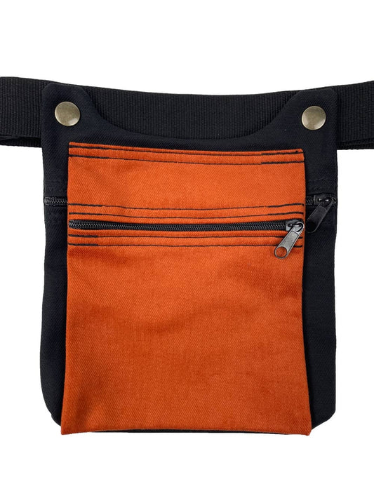 Riñonera artesanal en tela en color naranja y negro