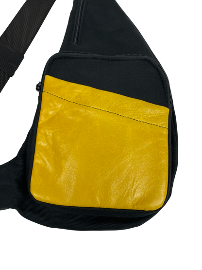 RIÑONERA BANDOLERA AMARILLA